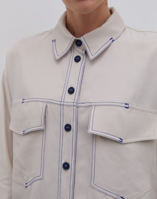 Ivory with blue stitches shirt